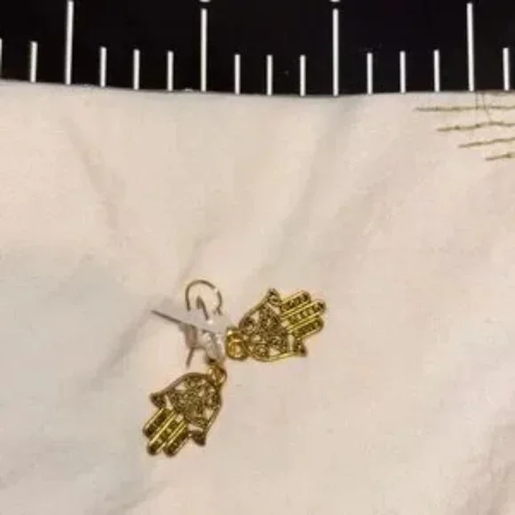 This is a pair of Hamsa hand earrings. Brand new Brass surgical metal nwt - Picture 2 of 2